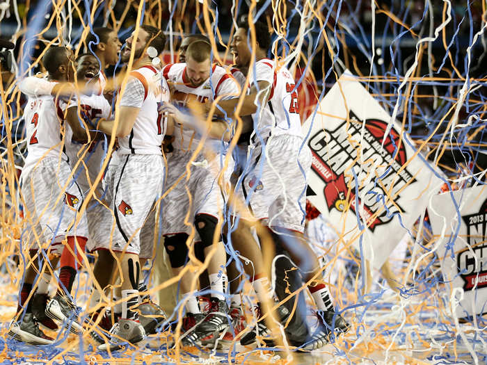 Louisville celebrates after beating Michigan in the National Championship.