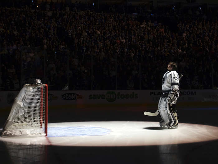L.A. Kings goalie Jonathan Quick listens to the National Anthem before a game.