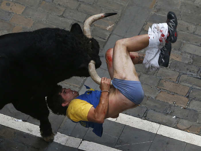 A Spanish man was gored at the Running of the Bulls festival in Pamplona.