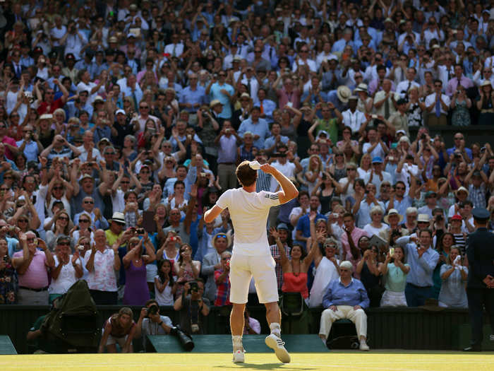 Andy Murray acknowledges the crowd after winning Wimbledon.