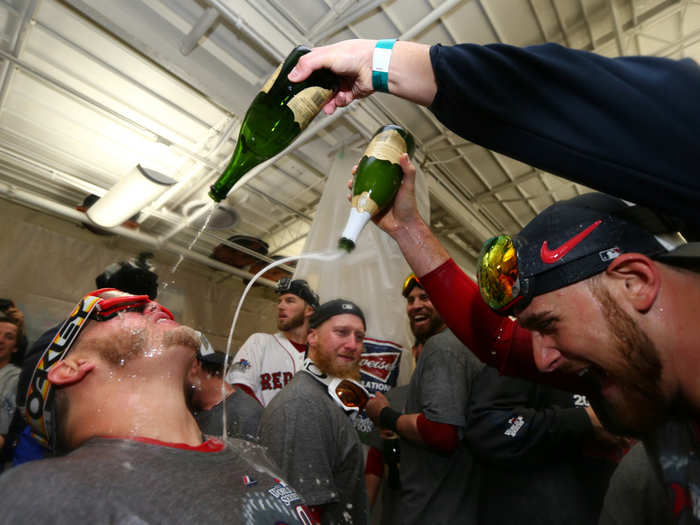 The Red Sox have a frat party in the locker room after winning the World Series.