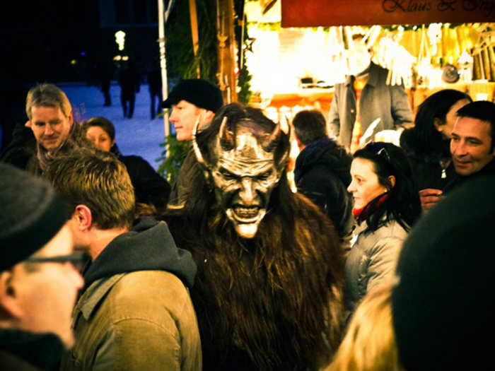 In Austria, young men dress up as the Krampus and roam the streets to frighten children.