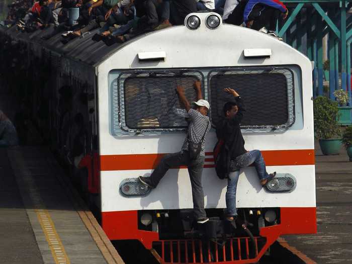 In Jakarta, Indonesia, the front of the train is fair game, too.