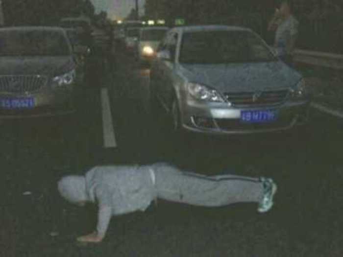 People do push ups in the middle of busy highways.