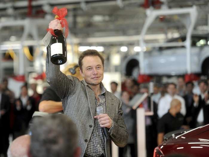 He knows how to celebrate a victory — here he is at the Tesla factory when it started delivering the Model S.