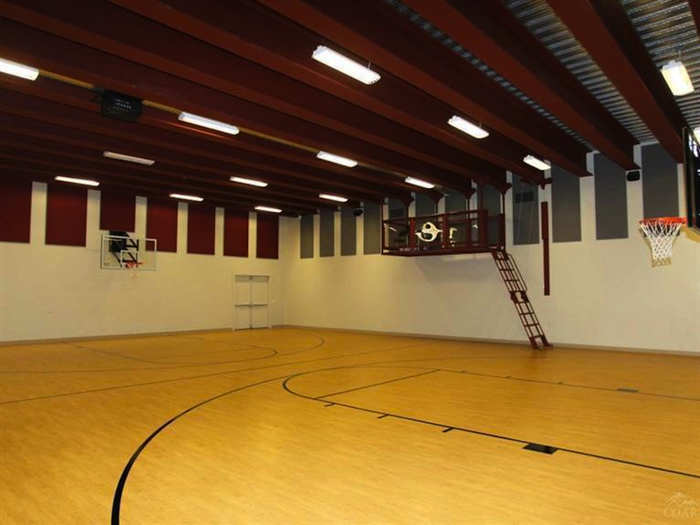 He also has an indoor basketball court with retractable backboards