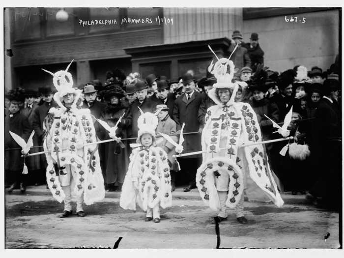 1909: The annual Mummers Parade in Philadelphia is one of the oldest folk festivals in America. Here is the parade in 1909.