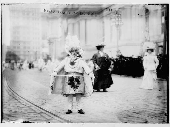 The parade involves different groups that prepare elaborate costumes and performances.