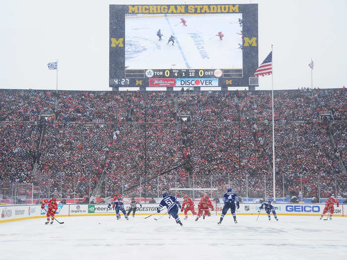 The Michigan Stadium jumbotron loomed over the ice.