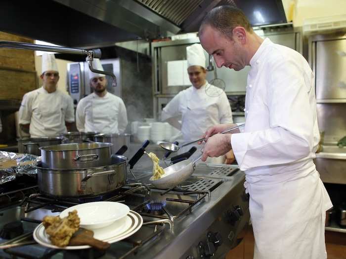 After the auction, Alessandro Boglione cooks pasta at the Ristorante al Castello, a Michelin-starred restaurant set in a castle in Grinzane Cavour.