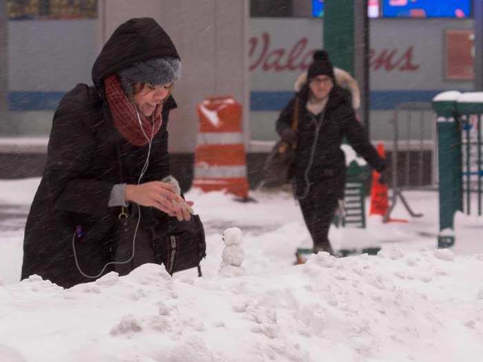 Amid the tourists, commuters, and police, one woman had a different agenda Friday morning.