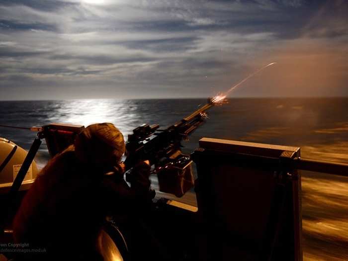 The HMS Dragon is another Type 45 destroyer. Here, a Royal Navy gunner takes part in a live firing exercise, during which all of the Dragon