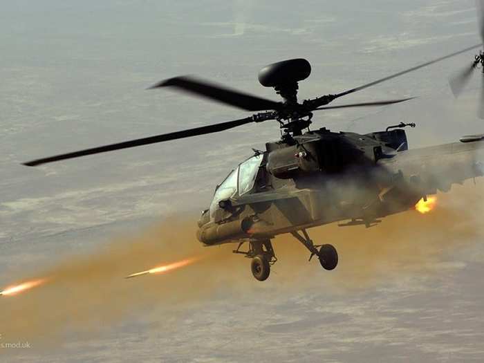 The British Forces currently have 67 Apache helicopters. The Apache is designed to hunt and destroy tanks and can operate in all weathers. Here, an Apache fires rockets at insurgents during a patrol in Afghanistan in 2008.
