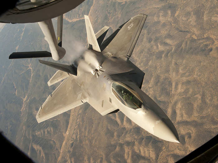 An F-22 Raptor backs away from a KC-135 Stratotanker during a training mission over central New Mexico. The Raptor is assigned to the 49th Fighter Wing at Holloman Air Force Base, N.M., and the KC-135 is from McConnell Air Force Base, Kan. (U.S. Air Force photo/Airman 1st Class John Linzmeier)