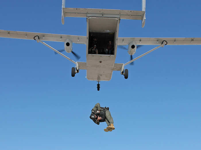 Tech. Sgt. Matthew Mensch exits a SC.7 Skyvan with a low profile parachute over the Edwards Farm drop zone, near Edwards Air Force Base, Calif. The parachute is intended to replace the BA-22 parachute, which is currently configured for use in the AC-130 Gunship. Mensch is a parachute test jumper assigned to the 418th Flight Test Squadron. (Courtesy photo)