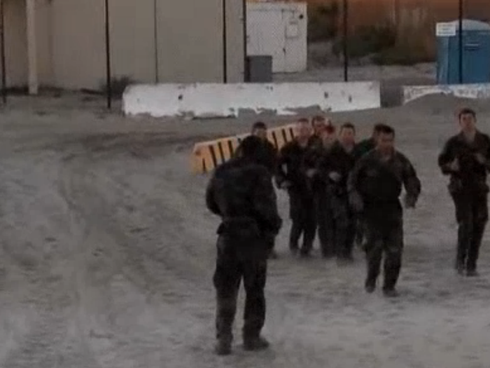 Candidates run more than 22 miles, swim in freezing water for 5 miles, and endure a merciless obstacle course. When one sailor falls behind, the rest of his teammates run towards him for support and they finish this exercise together.