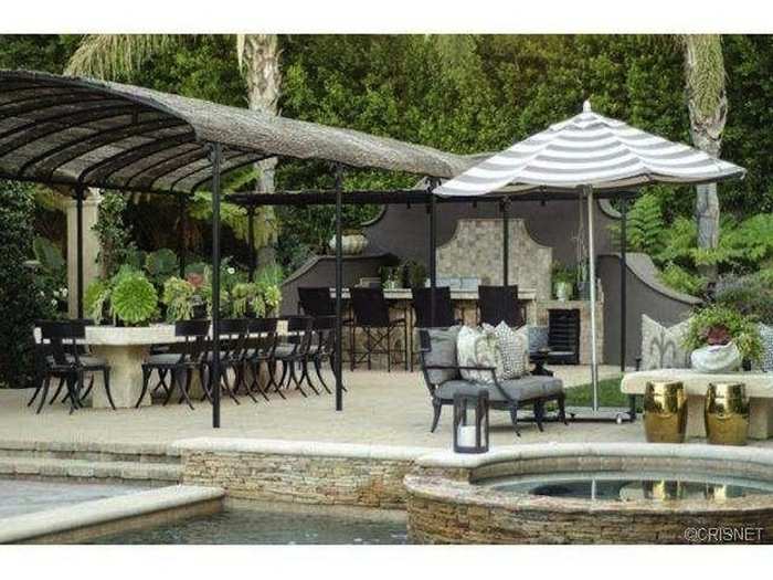 This outdoor barbecue and kitchen area would be great for late-summer dinner parties.