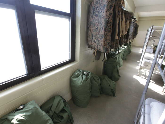 Because graduation is close, recruits have their dress and service uniforms staged for pickup.