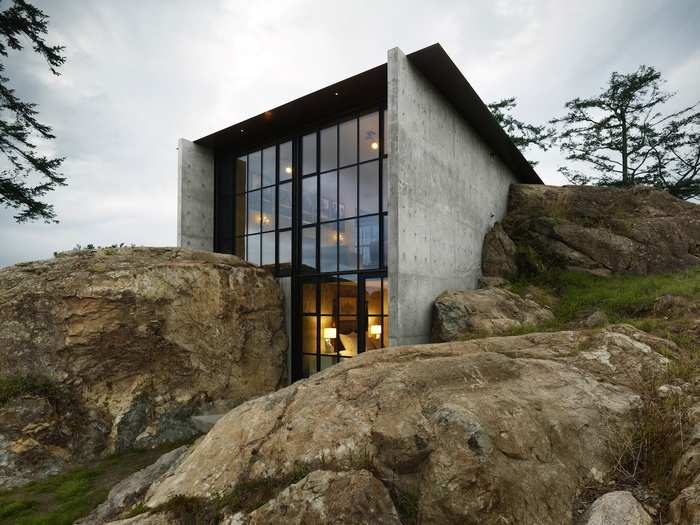 The Pierre house juts out of rock near the shore of Washington