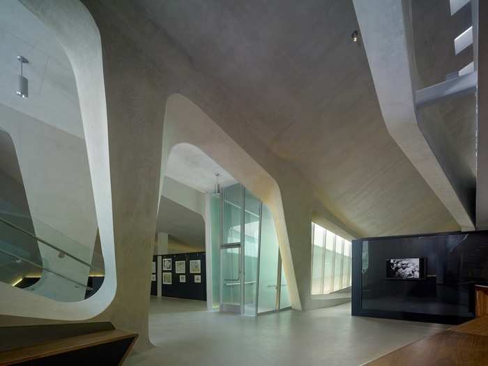 Once inside the Los Angeles Museum of the Holocaust, lighting dims as visitors travel further into the exhibits and deeper into the hill. (Belzberg Architects)