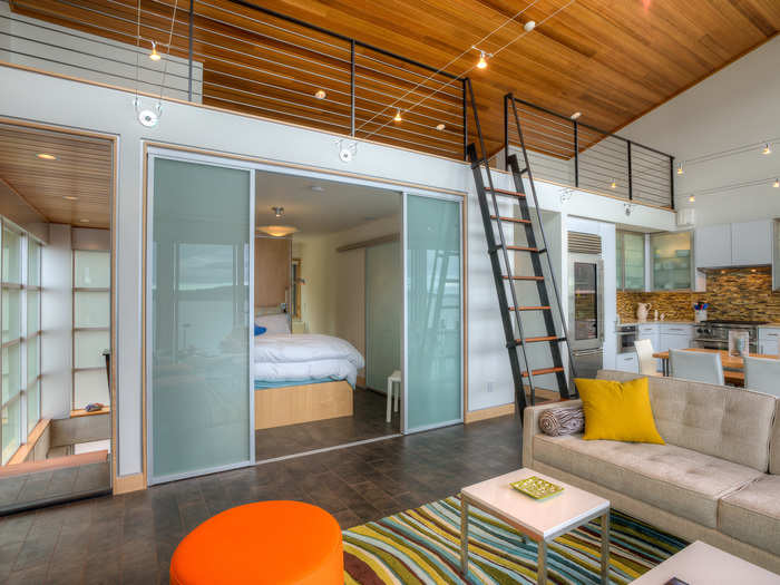 The floors of the home are porcelain tiles and the ceiling is made from gorgeous red cedar wood.