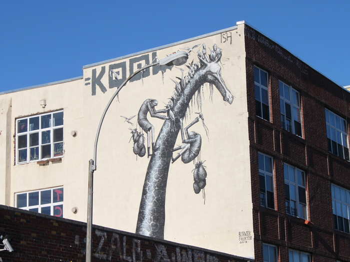 The street artist known as Phlegm came to Bushwick all the way from London to paint this giraffe in his signature style.