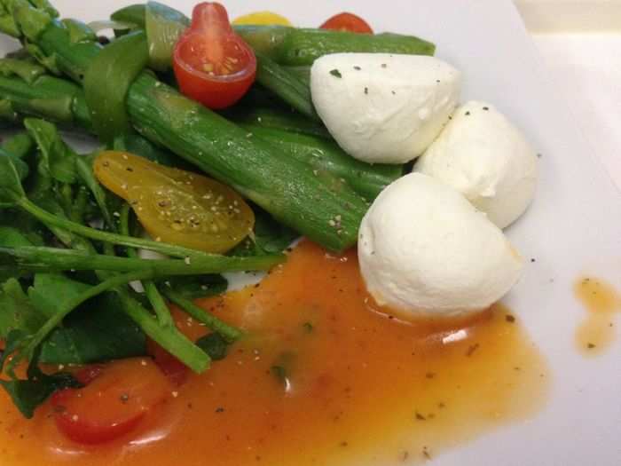 Alas, the mozzarella balls are frozen. (Little chewy ice-balls.) I let them thaw. Then eat them.