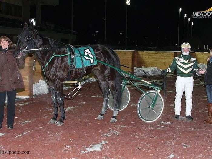 I got to present the ceremonial trophy to Yannick Gingras, who drove Celebrity Lovin to victory in 1:57.3 during the second race.