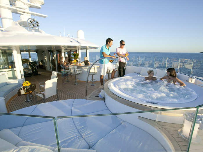 With its hot tub and bar, the top deck is made for entertaining.