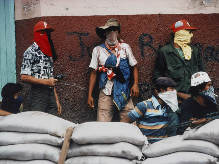 Muchachos await a counter-attack by the National Guard during the Nicaraguan Revolution in 1978.