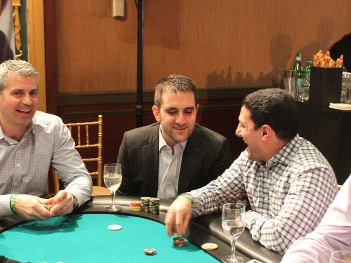Sanford Bernstein vice president Michael Sabat (center) and Pershing Square Capital trader Ramy Saad (right)
