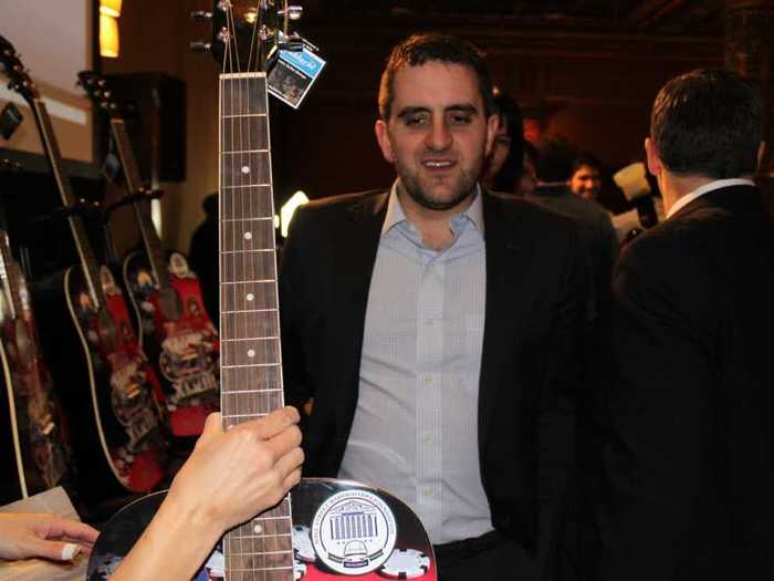 The top six finishers received these guitars. Michael Sabat, who works in equity derivatives sales and trading, got one.