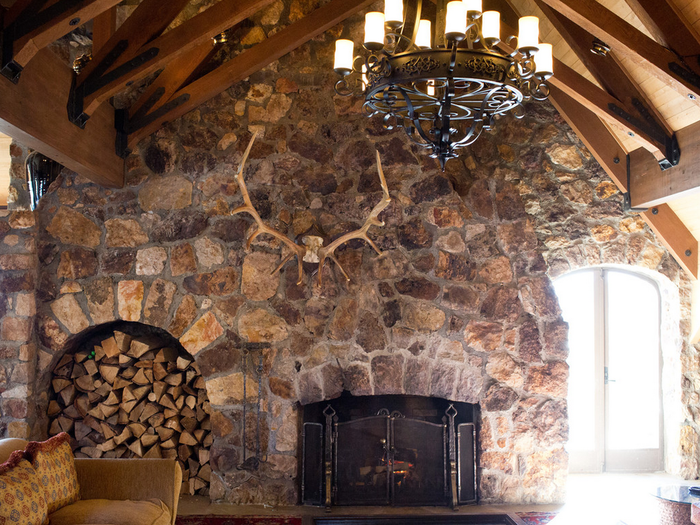 The home has five fireplaces with the largest one measuring in around 6 feet high.