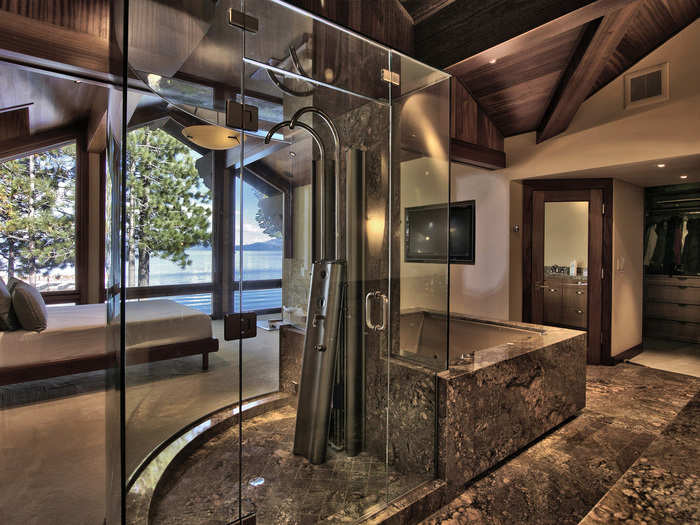 ... an all-glass shower designed to extend the master bedroom