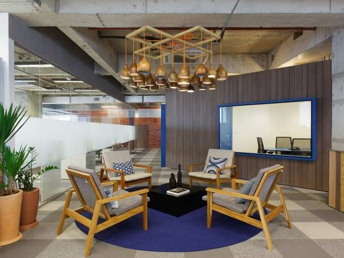 Employee lounges have beach chairs and look like the patios and balconies of Brazilian homes.