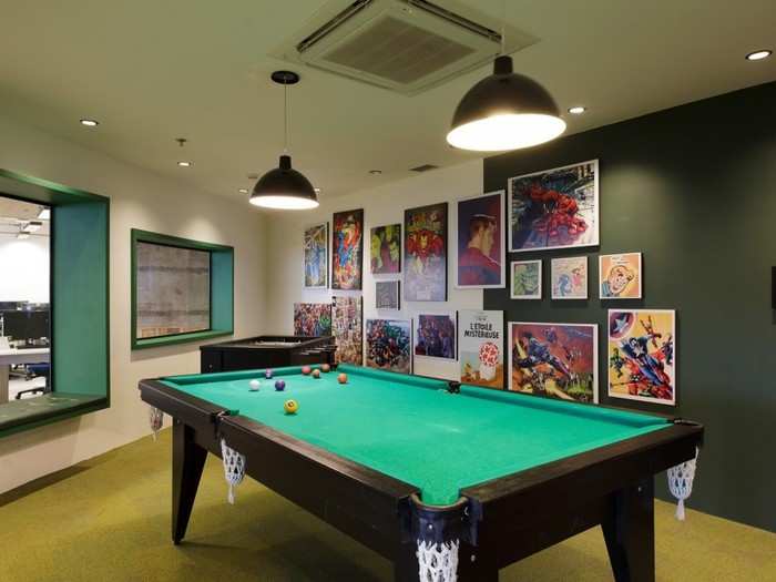 The green floor has a game room in the center.