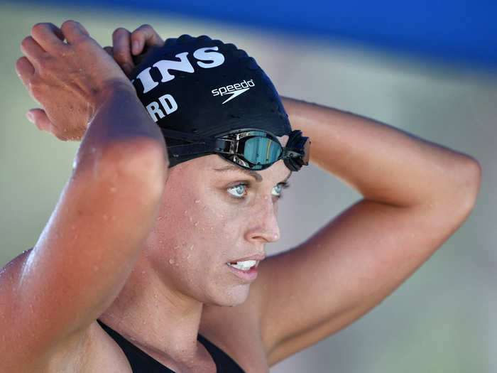 Swimmer Amanda Beard said Olympians "walk around for miles trying to sneak somewhere" if they are given curfews.