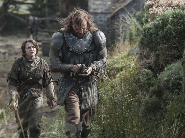 Off on her own, Arya Stark (Maisie Williams) is traveling with The Hound (Rory McCann).