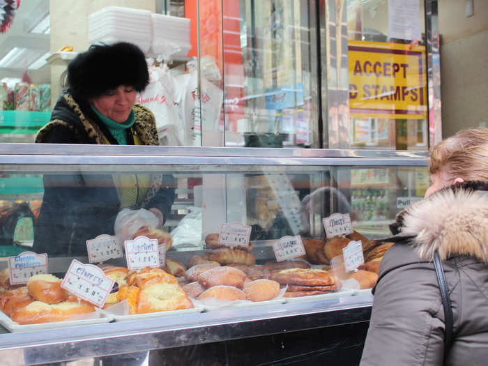 Famished shoppers can purchase a pirozhok, a flaky, hand-held bun stuffed with a variety of fillings, such as beef, mashed potatoes, mushrooms, cabbage, or fresh fruit. The most popular variety, cherry, sells for $1.50.