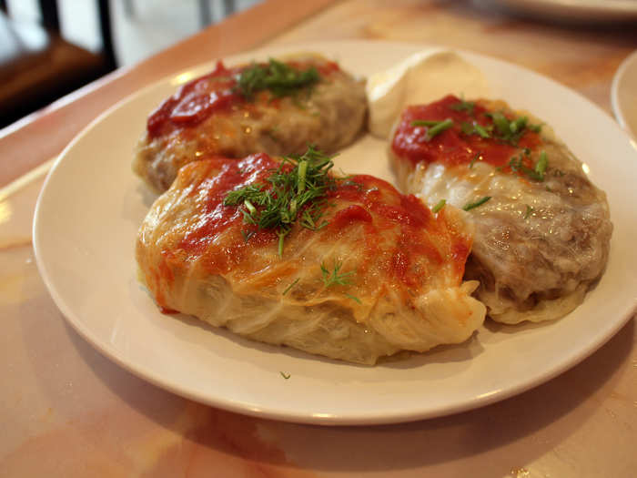 The braised cabbage stuffed with rice and meat ($4.29) tasted like grape-leaf dolmas dressed in tomato-sauced onion.