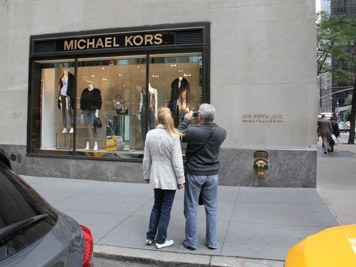 Kors pursued a strategy of selling at department stores until 2003, when Sportswear Holdings Ltd. spent $100 million on an 85% stake in the company, buying out shares held by LVMH and other investors.