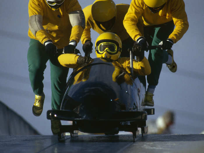 The Jamaican bobsled team, competing for the first time at an Olympics games, stole the headlines at the 1988 Winter Olympics in Calgary, Alaska. The team crashed in the four-man event, but was cheered as they pushed the sled across the finish line.