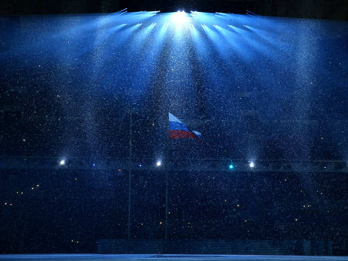 The Russian flag amid falling snow.