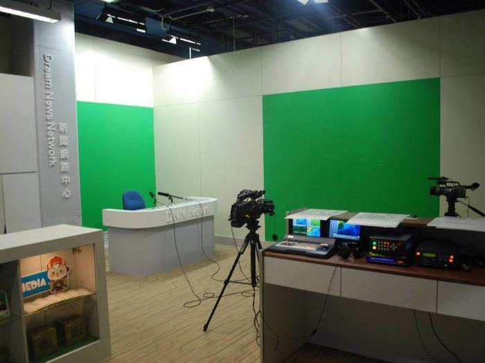 The area is designed to allow children to play in a future career atmosphere — like a television studio, complete with green screens.