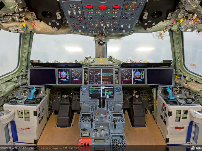 The flight deck is designed to be ergonomic and easy to use for pilots accustomed to different Airbus planes. This cockpit, in test aircraft MSN1, was powered up for the first time in August 2012.