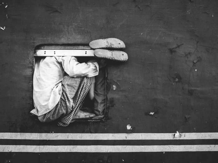 Homeless children in Chittagong, Bangladesh search for a place to rest.