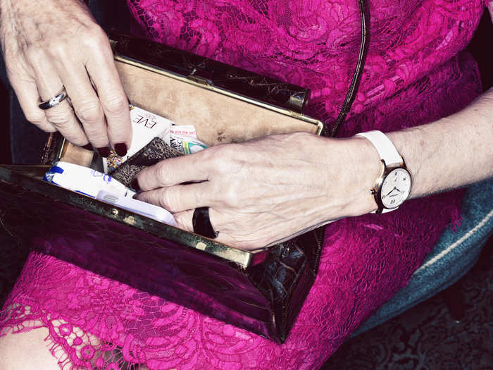 PROFESSIONAL: A woman looks through her purse in "Timeless."