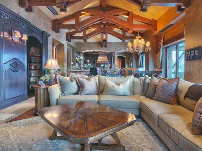 The vaulted ceiling with exposed beams make all the rooms seem even loftier.