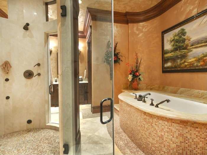 And here is the master bath with a soaking tub, steam shower, and his and hers sinks.