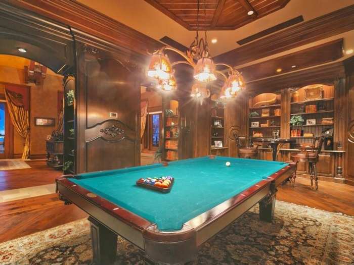 A pool table in the game room.